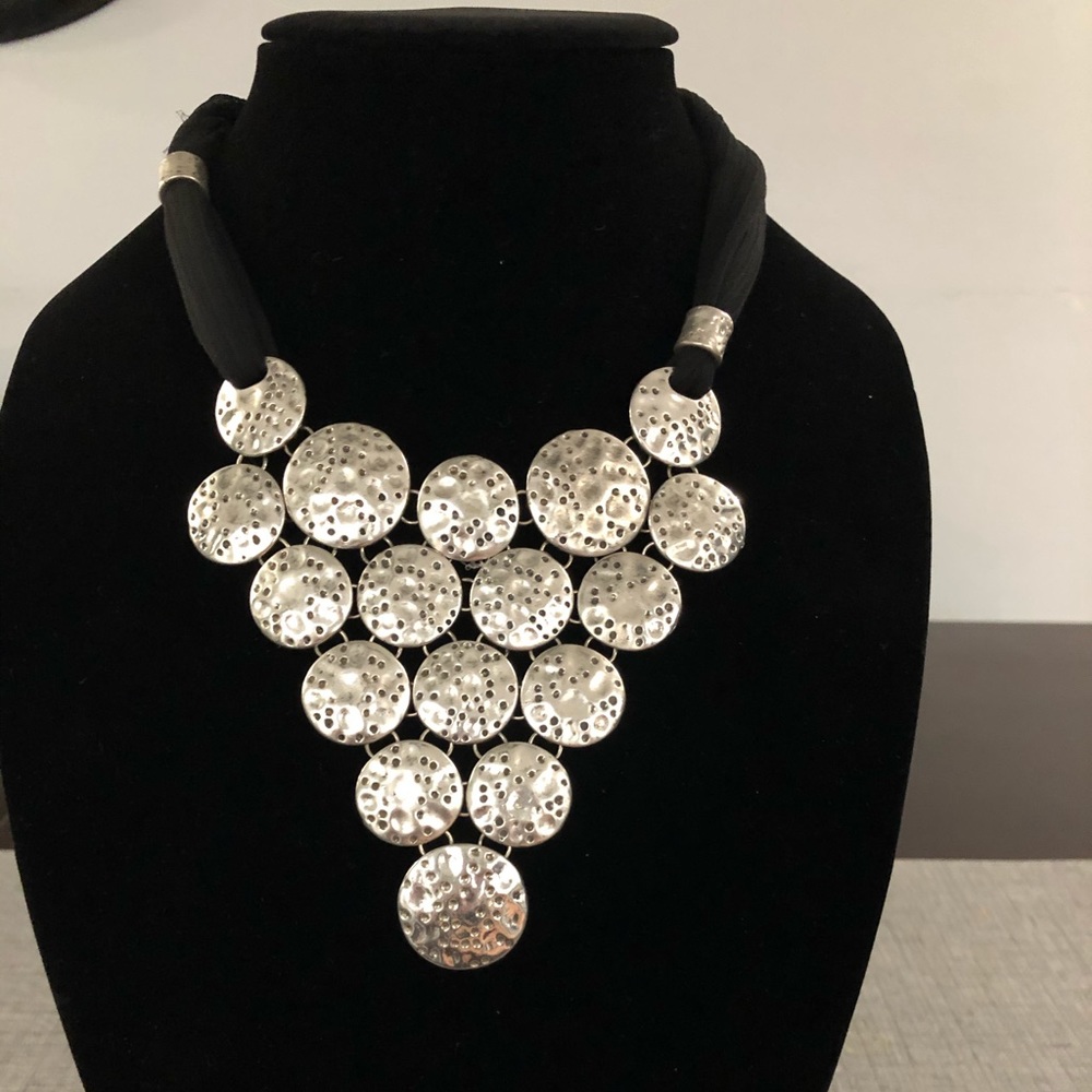 silver necklace with black fabric chain